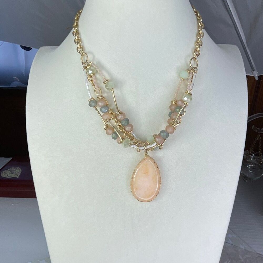 Multi layered faceted pastel stones with a teardrop peach decor boutique